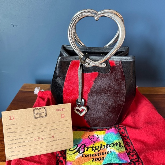 Retired collectible cowhide and leather purse. - Picture 1 of 2